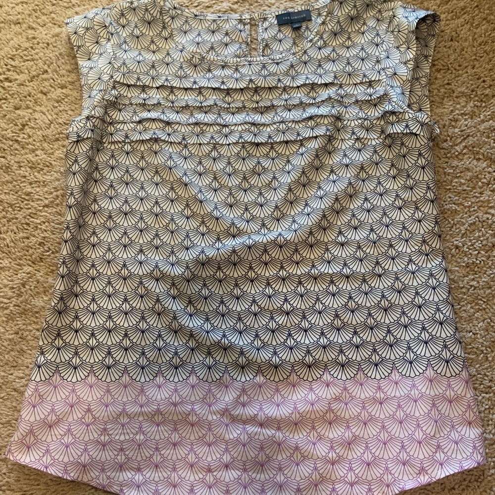 The limited blue and purple blouse with eyelet detail